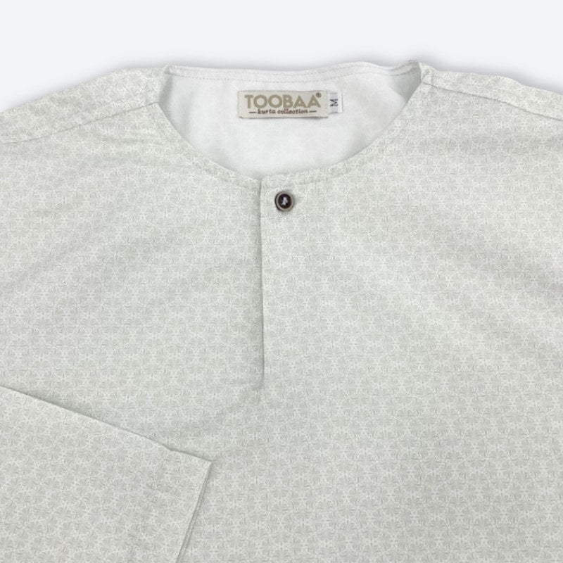 Close-up of a white batik men's kurta, featuring the brand 'TOOBAA' on a white background.