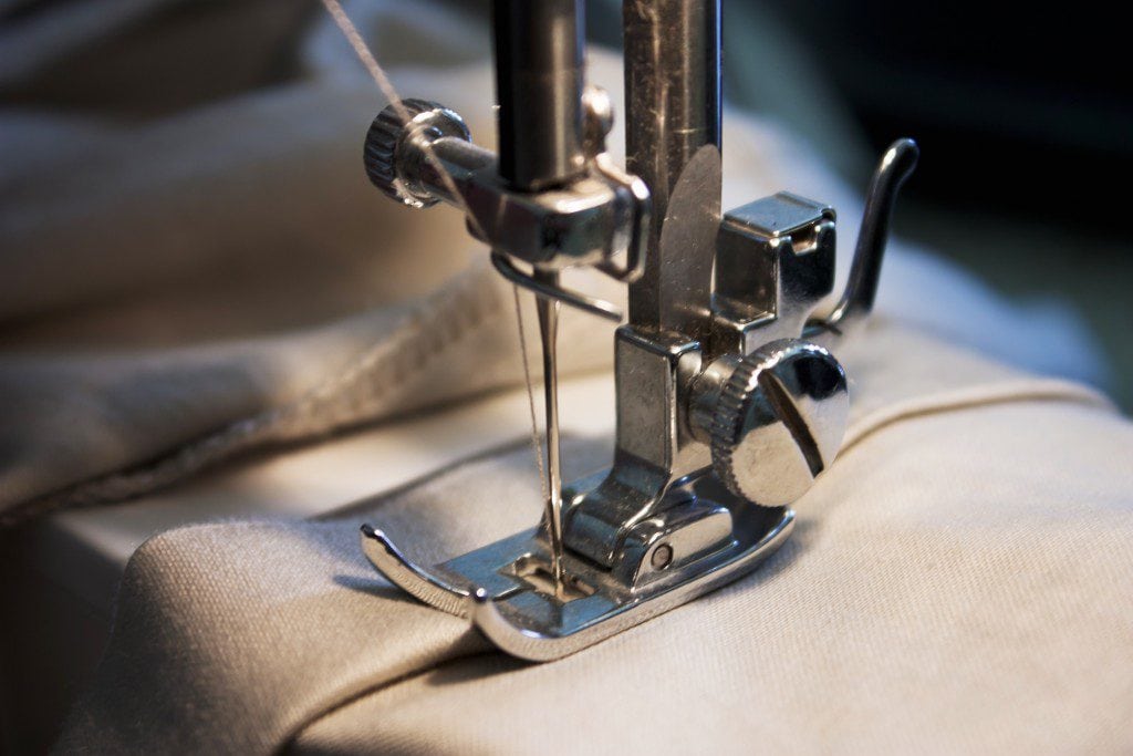Toobaa - close-up of sewing machine needle on fabric