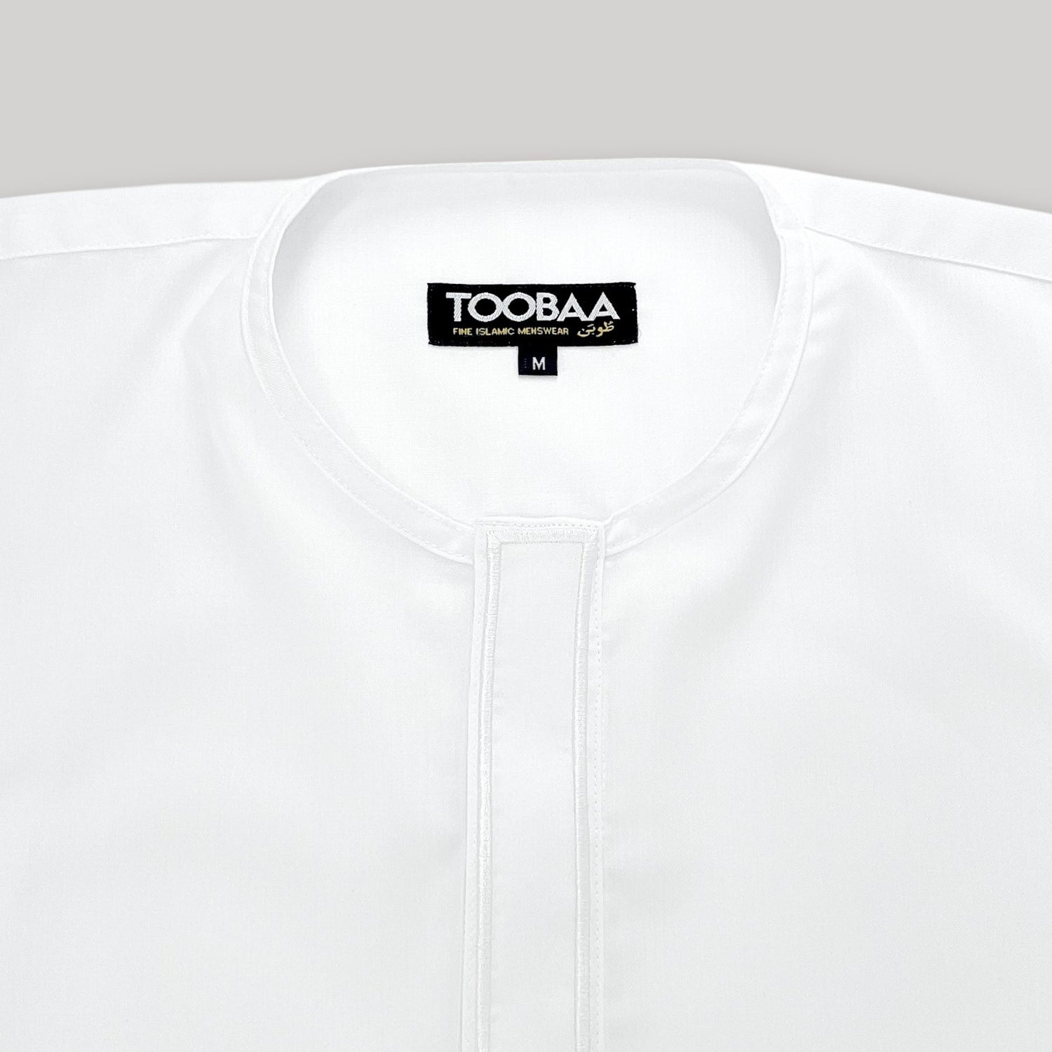 Detailed view of Toobaa's pristine white men's thobe - Jubah Ihsan 